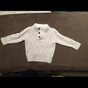Toddler boys cream cable knit sweater.
